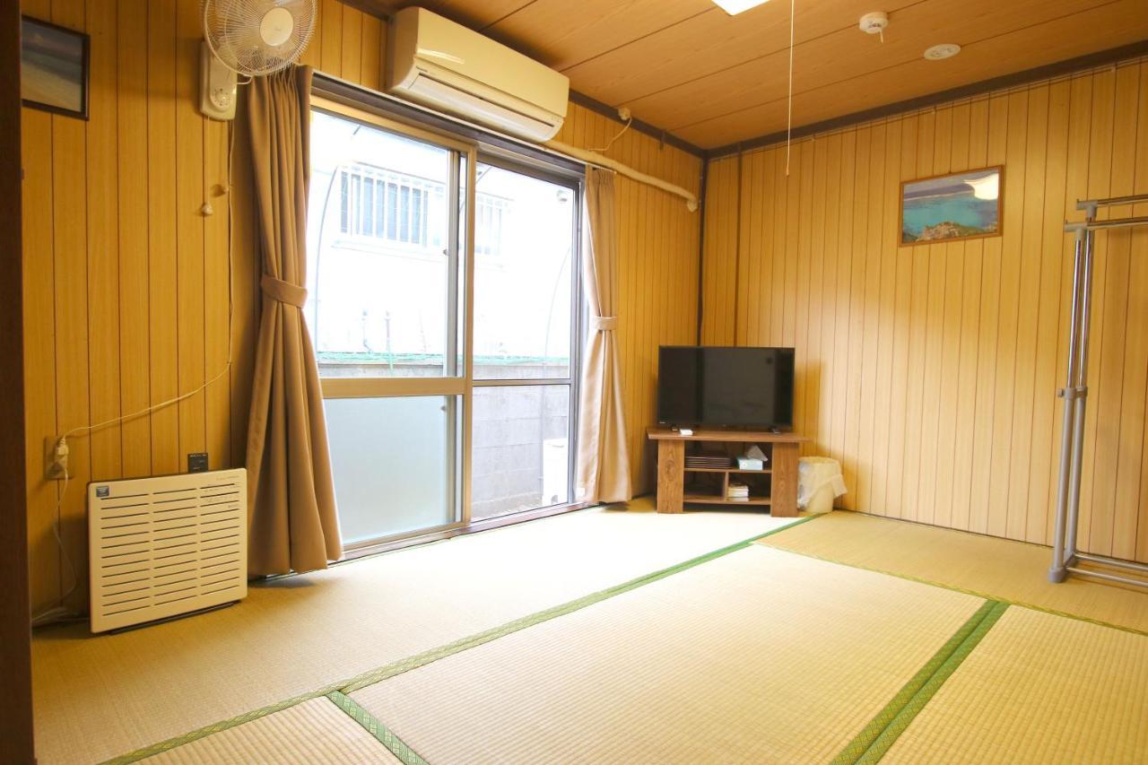 Okinawa Naha Jinjin -沖縄伝統体験型宿じんじん- Exterior foto